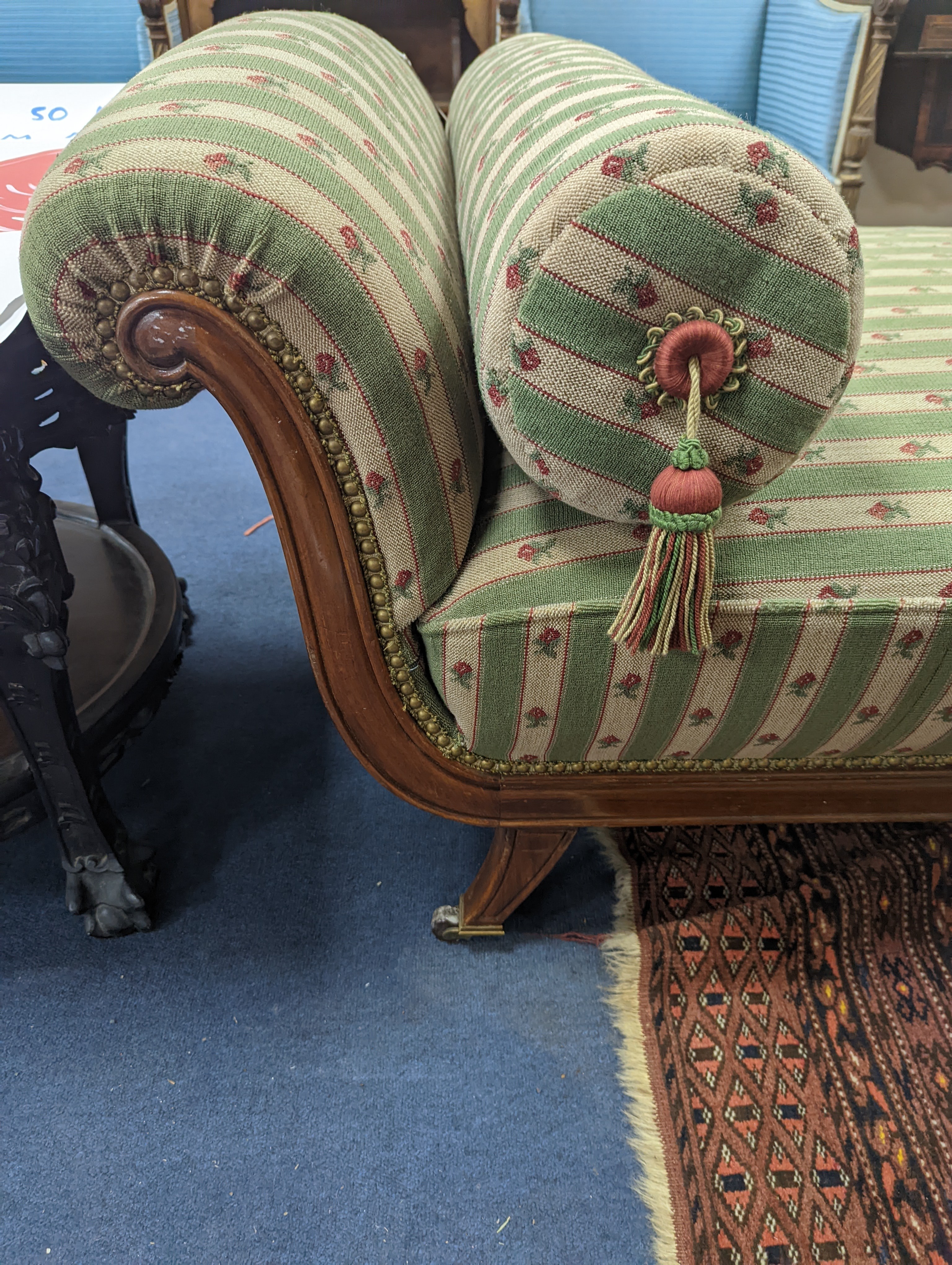 A 19th century Continental mahogany upholstered day bed, length 210cm, width 78cm, height 64cm